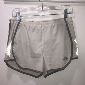 North face white workout shorts w reflective sides